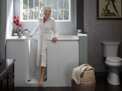 women walking out of a walk in tub