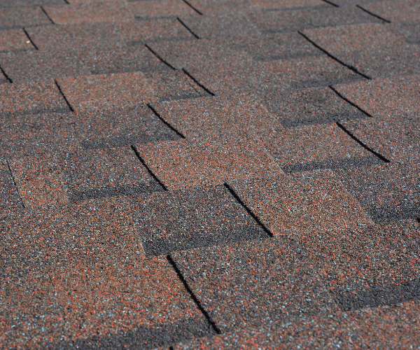 close up of asphalt shingles on a roof